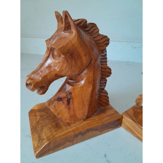 Enhance your bookshelf with this **Vintage Mid-Century Modern (MCM) Pair of Hand-Carved Beechwood Horse Head Bookends**....