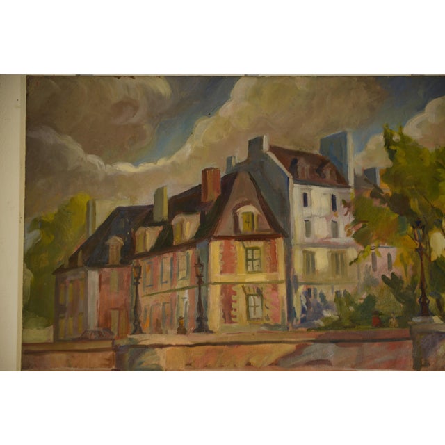 Oil on canvas depicting a stone bridge lined with old houses and trees under a dramatic sky. A warm palette of ochres,...
