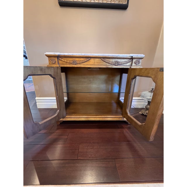 Elegant classical-style cabinet with a genuine marble top. A beautiful and sophisticated small cabinet, perfect for a...