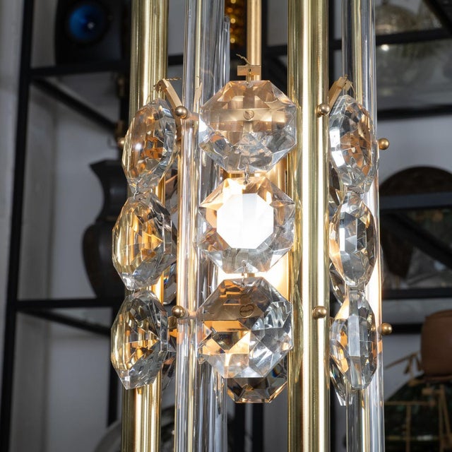 Brass pendant composed of facet-cut crystal elements and crystal rods in the style of Lobmeyr.