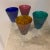 Set of four multicolor Murano wine glasses, frosted in look and feel with raised open circles. Signed with two raised M’s...
