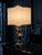This Art Nouveau brass lamp features an elegant and refined design, featuring a delicate cherub that enhances the overall...