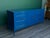 This is a solid built walnut dresser of nine drawers This dresser is newly refinished in high gloss blue lacquer...