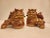 A pair of Vintage Lion Foo Dogs in a unique cinnamon and caramel color. Hand-painted with highly intricate Moriage...