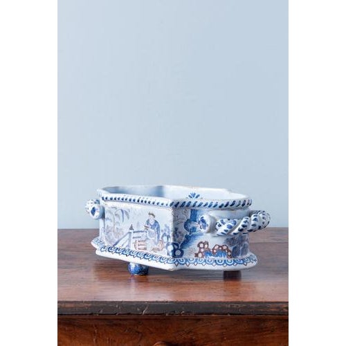 Height: 12 cm Width: 33 cm Depth: 17.5 cm One small chip to lower edge. Minor wear throughout, commensurate with age....