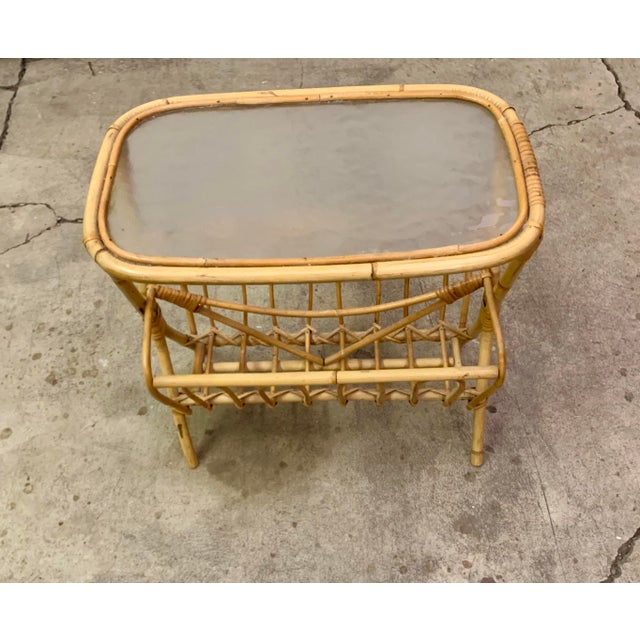 A bamboo, rattan and glass side table designed and produced in Sweden, c. 1950s. Unsigned..