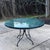 Add mid-century sophistication to your outdoor landscape or interior sunroom with this exceptional vintage round dining...