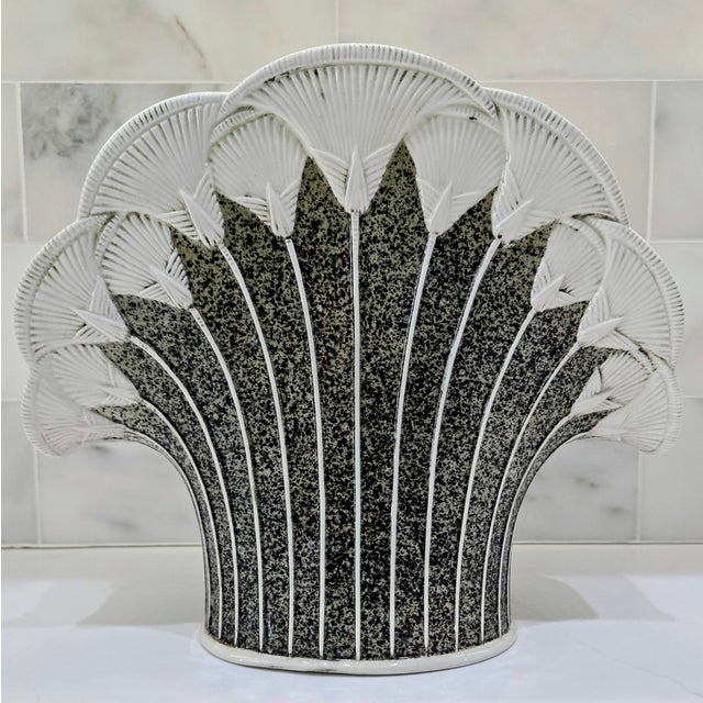 Striking Italian ceramic vase in a dramatic fan–shell silhouette, finished in a richly mottled green and brown speckled...