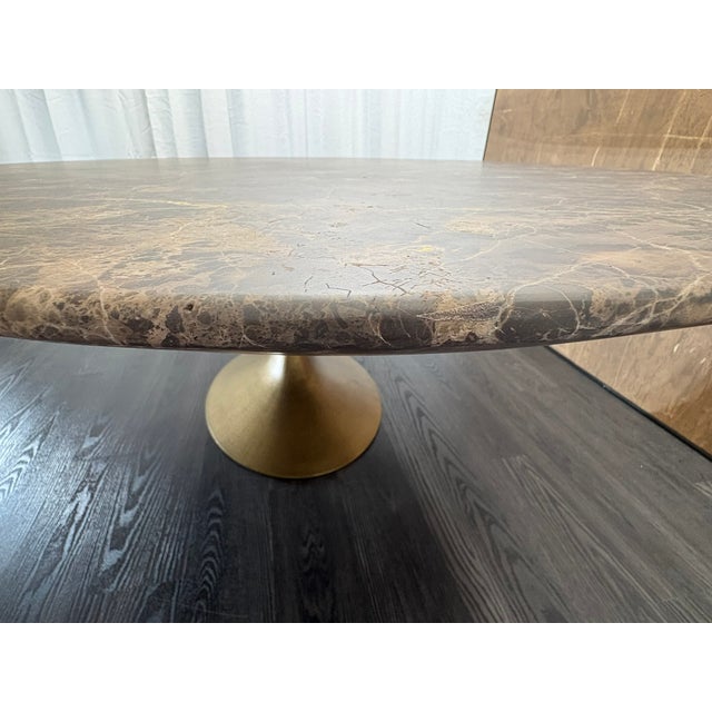 RH Aero Stone Oval Dining Table — 96" Brown Emperador Marble | Antiqued Brass Pedestal Base | Sculptural Oval Design Open...