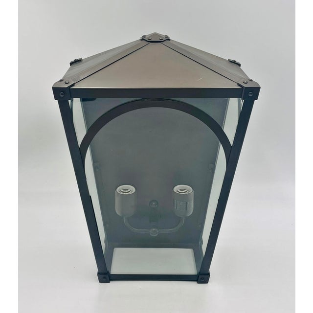 Architectural “Mercer 17” exterior wall lantern designed and manufactured in the United States by Remains Lighting, one of...