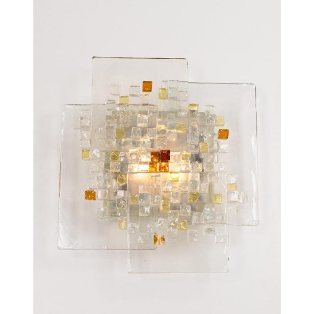 Brutalist mid-century wall sconce italy, 1970s wonderful sconce / wall applique, 1960s. Structure of iron with the surface...