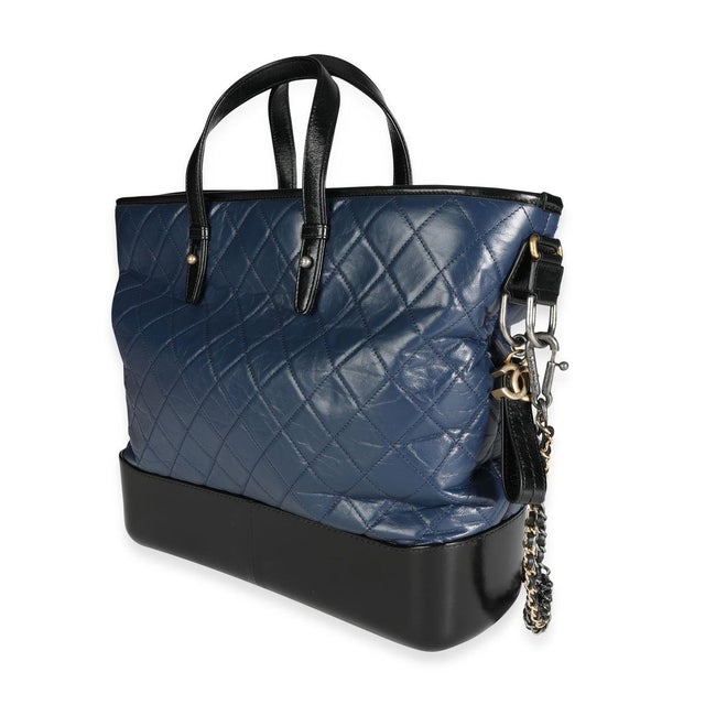 Item #: 117638 Exterior Material: Leather MSRP: 4,100 Interior Material: Fabric Size: Large Features Interior: Two slip...
