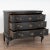 The black painted finish is striking in this oak chest of three drawers resting on curved cabriole front feet. The newly...