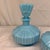 Elevate your vanity, boudoir, or bathroom styling with this striking 3-piece vintage vanity set produced by Balboa in...