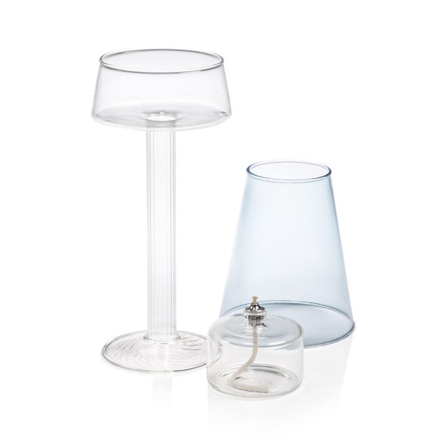 The Dauphine Glass Table Lamp merges function with artistic craftsmanship, featuring a sleek glass silhouette that houses...