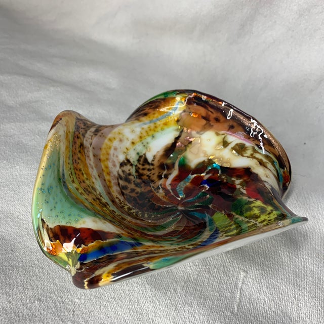 This is a vintage mid-century Italian Murano art glass "Rest of the Day" decorative bowl featuring a vibrant multicolored...