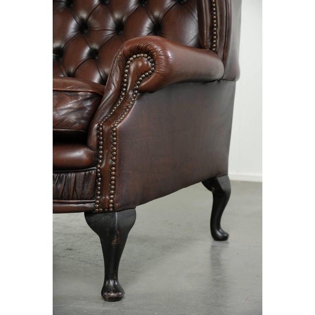 English Cowhide Chesterfield Wing Armchair For Sale - Image 11 of 13