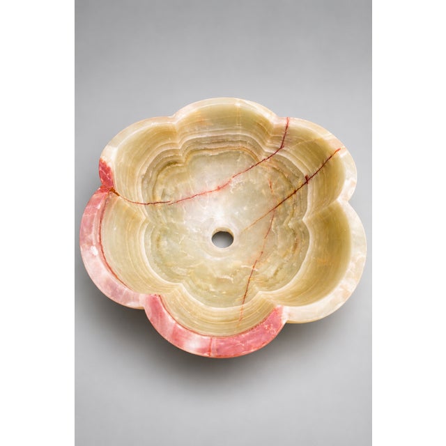 Elevate your bathroom with this exquisite hand-carved natural onyx vessel sink, expertly crafted in an elegant floral...