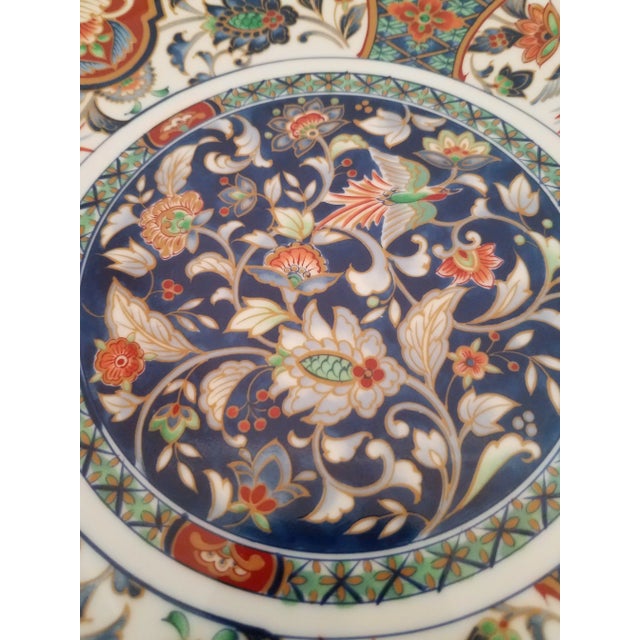 Vintage Japanese Imari hand painted scalloped shallow decorative bowl. Marked on the bottom. Decorative, not for food....