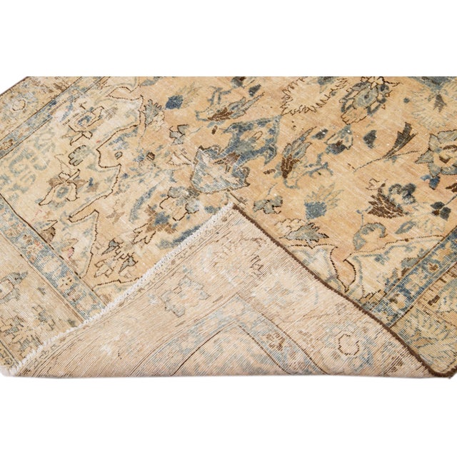 Beautiful Vintage Medallion hand-knotted wool runner with a beige field. This runner has blue, pink and tan accents all-...