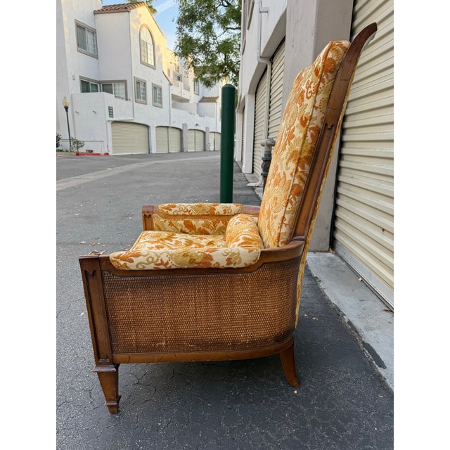 Striking vintage high-back lounge chair by Tomlinson Furniture, known for their refined American craftsmanship and...