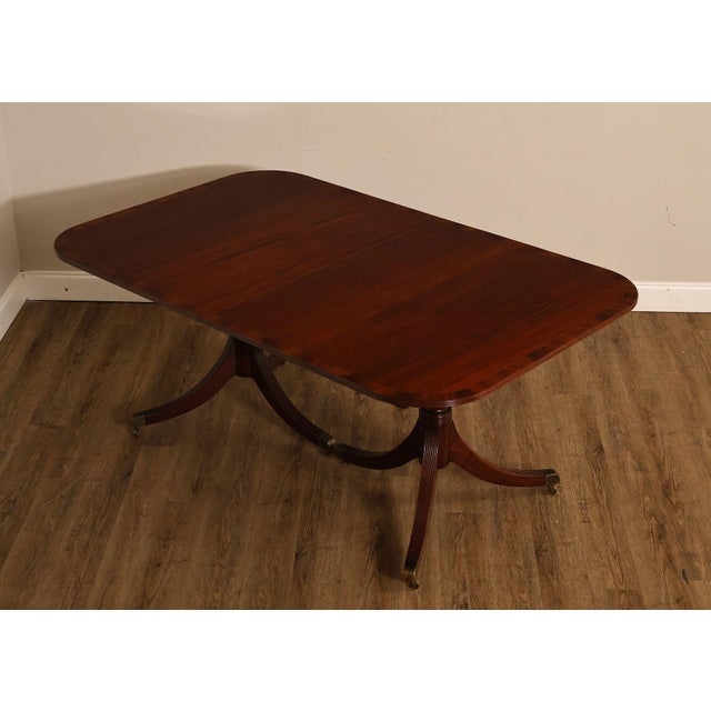 High Quality Mahogany Double Pedestal Dining Table In The Duncan Phyfe Taste. Features A Rectangular Top With Rounded...