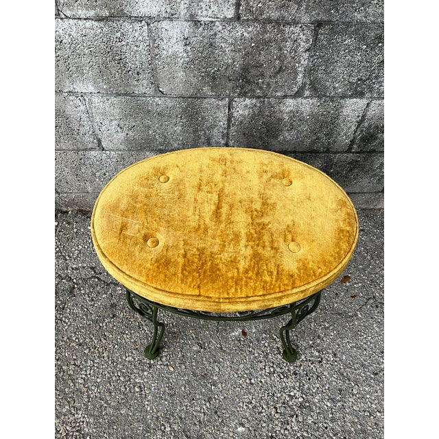 Vintage Mid-Century Modern Wrought Iron Vanity Stool. Circa 1960s Features an avocado green wrought iron frame with the...