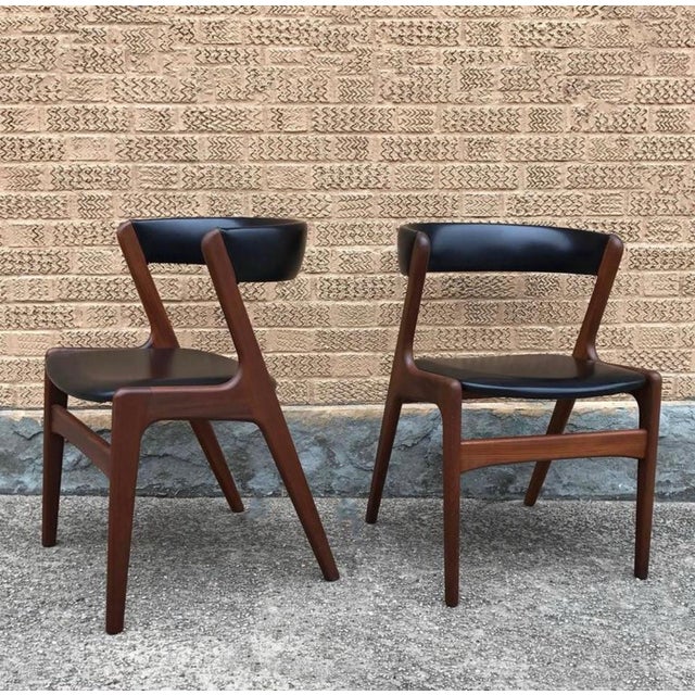 Pair of T21 model chairs, also known as the "Fire" Chair, Attributed to Kai Kristiansen from Denmark. These chairs really...