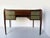 Vintage 1950s desk in the style of Vittorio Dassi, crafted from mahogany with a polished finish. The supporting structure...