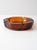 This vintage amber glass ashtray features a bold Federal eagle design at the center and includes five rests for cigars or...