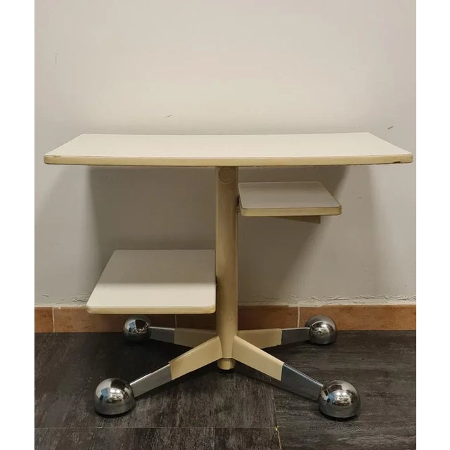 Table with wheels of the Allegri Parma company. Rare version of the iconic Space Age style table made by the Italian...