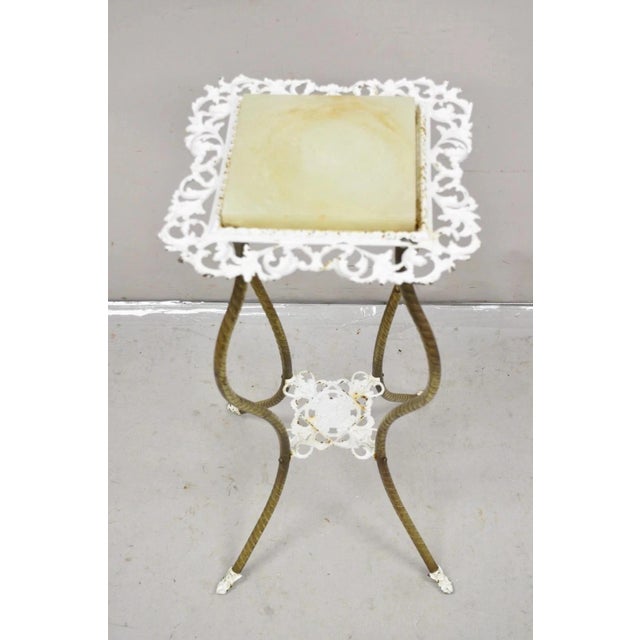 Antique Victorian Brass 2 Tier Onyx Stone Top Plant Stand Pedestal Side Table. Circa Early 20th Century. Measurements:...