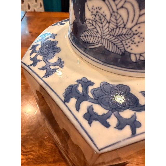 Beautiful octagonal Blue and White lidded jar. It features a lovely mountain scene with pagodas and weeping willows. Jar...