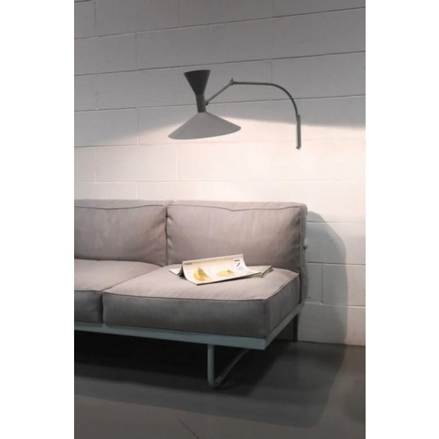 Small Le Corbusier 'Lampe de Marseille Mini' wall lamp for Nemo in gray. Designed by Le Corbusier for the Unit"...
