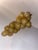 Lovely! Made in Italy Alabaster cluster grapes . Does have some weight Alabaster grape decor can be showcased in various...