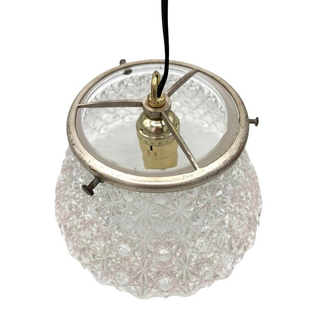This Victorian Daisy and Buttons pressed glass shade with a matching scalloped fitter showcases intricate geometric...