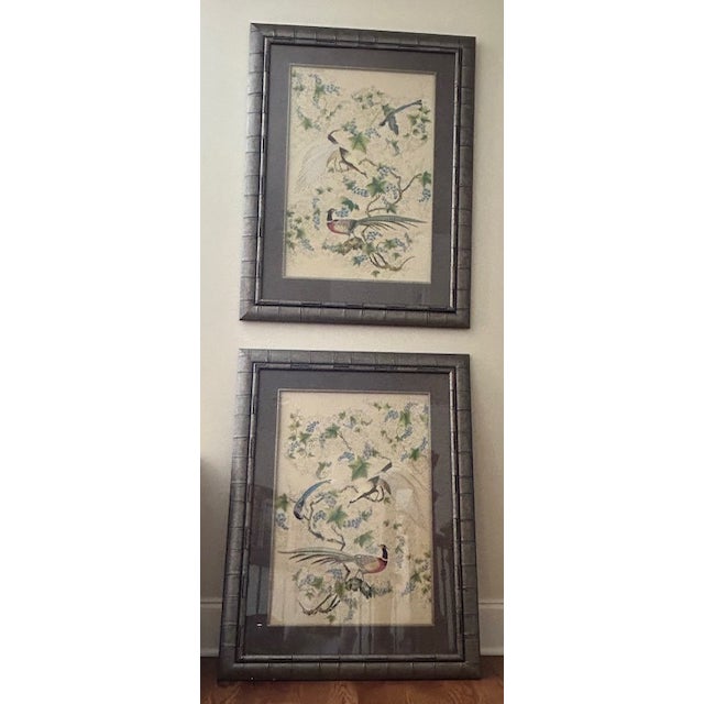 Pair of wood framed prints on silk behind glass from Chelsea House. Circa early 2000's. Asian inspired birds, right and...