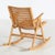 The ‘Rex’ rocking chair designed by Niko Kralj from the 1950s. The rocking chair is made of beech wood and is foldable....