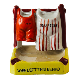 Vintage “Who Left This Behind” Ceramic Lusterware Ashtray & Match Holder – Whimsical Figural Smoking Accessory (C. 1940s–50s)