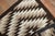 Early 20th Century Vintage Zabihi Collection Tribal Geometric American Navajo Rug - 3' x 3'8" For Sale - Image 5 of 6