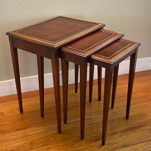 Three tables in the Edwardian Style that nest together and can be placed separately when needed. Excellent condition,...