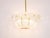 An elegant austrian mid-century modern brass chandelier from the 1950s, manufactured by j.t. Kalmar vienna, austria....