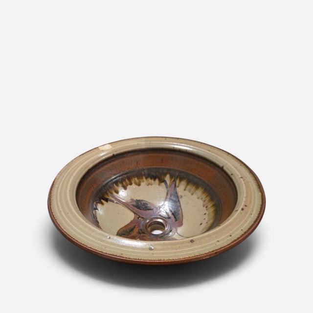 Eric Norstad trained as an architect before he became a ceramicist. That fact is the key to understanding this piece. Most...