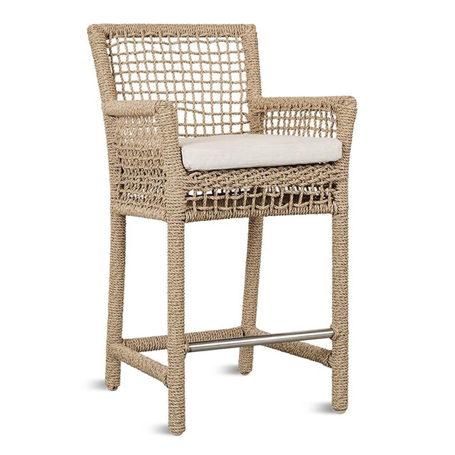Bring effortless coastal style to your outdoor entertaining space with this handwoven faux hyacinth outdoor counter stool....