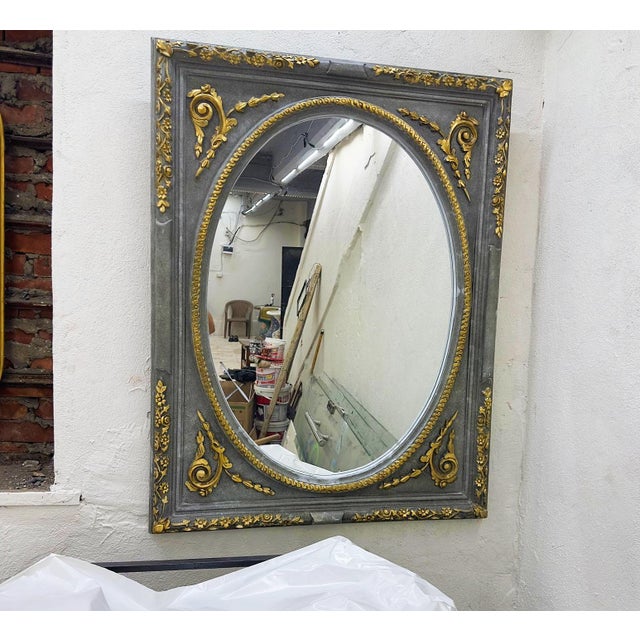 In love with the design. Lovely Baroque Wall Mirror showing a beatufil hand carved details refinished in gold leaf....