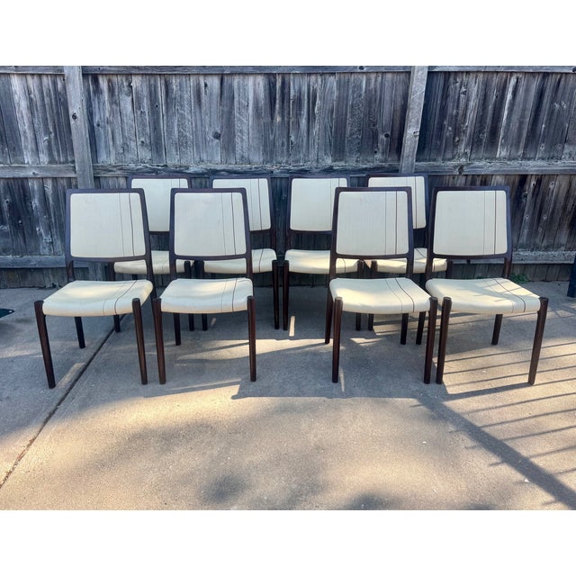 Rare model #86 rosewood dining chairs by J.L. Møllers Møbelfabrik of Denmark, a set of eight. Model was designed in 1985...