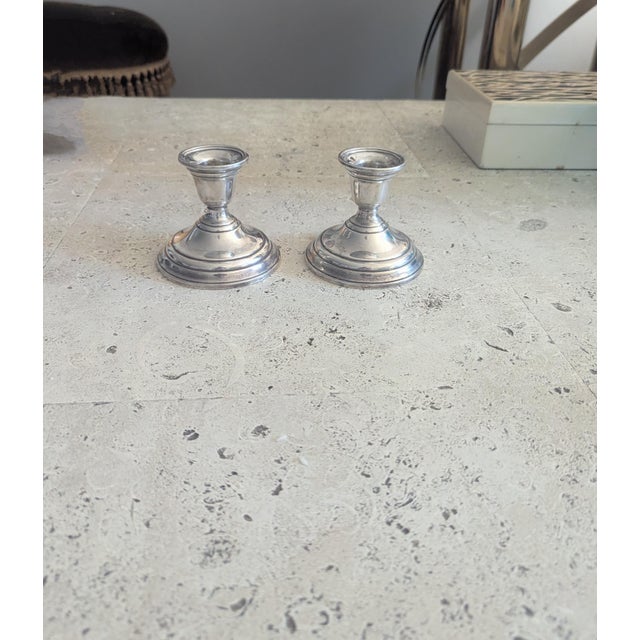 Sterling silver candlesticks made by International, accent piece or utilitarian or both, simple design.