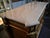 A very fine quality Louis XVI Style ormolu-mounted commode or chest of drawers with an Italian white marble top that is...