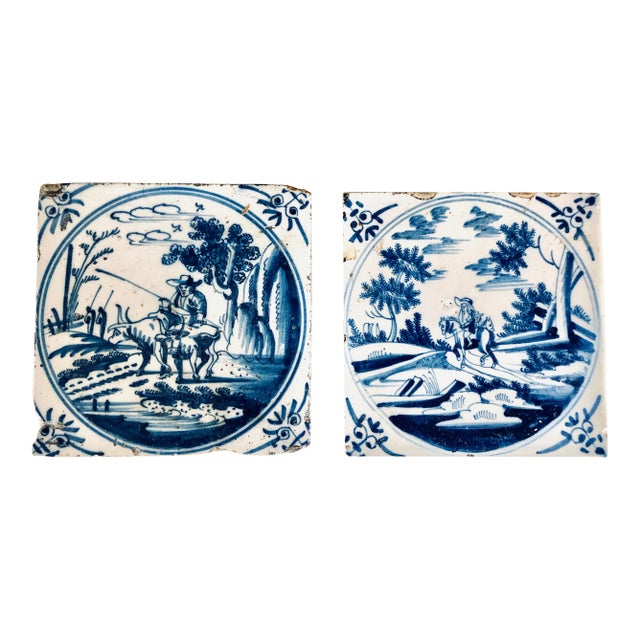 18th Century Delft Blue and White Ceramic Tiles with Country Scenes - a Pair For Sale