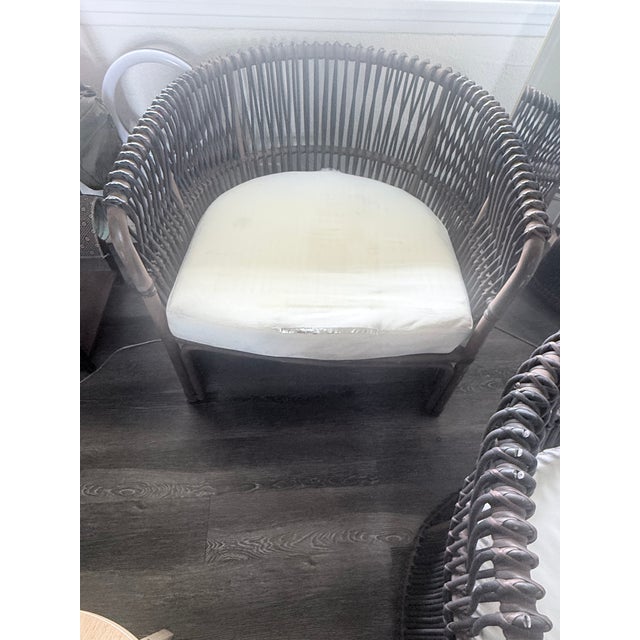 Pair of David Francis Rattan Lounge Chairs Beautiful matching pair of high-end David Francis rattan lounge chairs. These...